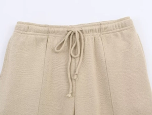 Detail view of the high-density knit waistband with elastic and matching drawstrings
