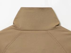 Detailed view of the stand collar and high-density khaki fabric on a women's short trench coat