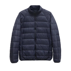 Detail view of lightweight standing collar quilted jacket with front zip and ribbed cuffs