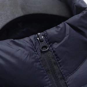Fashionable lightweight quilted puffer jacket with stand-up collar and smooth zipper closure