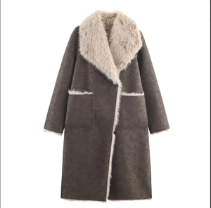 Detail of dark grey faux suede coat with large beige faux fur lapels and fuzzy trim