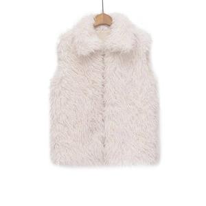 Detailed view of white faux fur vest texture with fluffy long-pile and wide lapel collar