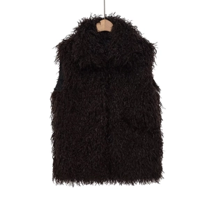 Detail view of brown faux fur vest with long curly texture and smooth black lining