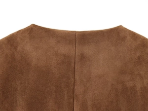 Detailed close-up of brown faux suede blazer collar with precision stitching