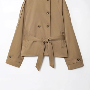Classic khaki short double-breasted trench coat with waist belt and long sleeves for women
