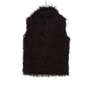 Detailed close-up showing the dense curly texture of black faux fur vest fabric