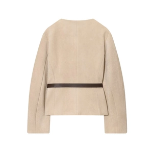 Back view of beige suede jacket featuring a thin dark brown waist belt and collarless design