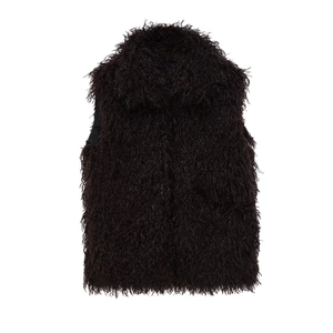 Detail shot of the long-pile texture and fluffy lining on this faux fur vest