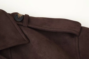 Macro shot of faux suede jacket shoulder detail with epaulette and button