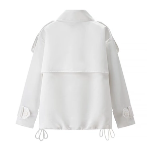 Back view of white cropped double-breasted trench coat with drawstring waist and epaulettes