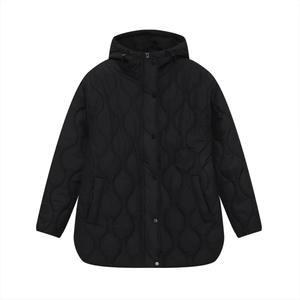 Detail of wave quilted pattern and windproof hood on long black winter parka coat
