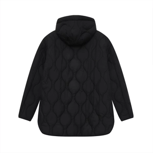 Detail view of wave-quilted black hooded cotton jacket showing the rear design and curved hem