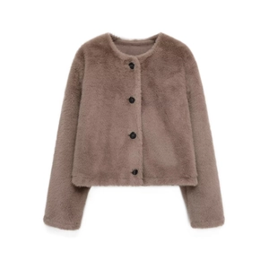 Detail of taupe faux fur jacket featuring black buttons and soft textured short silhouette