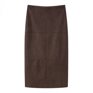 Detailed view of dark brown faux suede midi skirt featuring vertical panel stitching