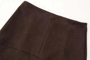 Detail view of high waist dark brown faux suede skirt with side zipper closure