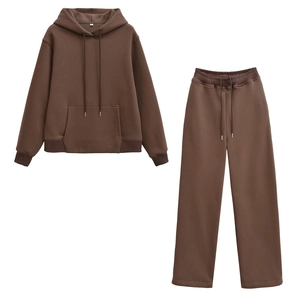 Detailed flat lay of dark brown hoodie set with ribbed cuffs and matching drawstring pants