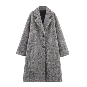 Women herringbone long double breasted wool coat with notch lapel on white background