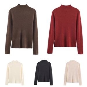 Detail view of mock neck ribbed knit tops in five colors including brown and cream
