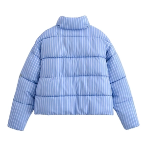 Detail view of the quilted back and light blue vertical stripes on this padded jacket