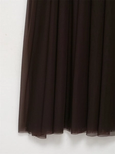 Detailed macro view of dark coffee mesh fabric layers with subtle vertical pleats