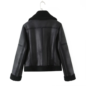 Back view of black faux leather biker jacket with plush shearling trim and hem details