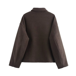 Back view of a deep brown oversized wool jacket featuring a minimalist drop shoulder design