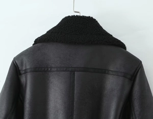 Detailed back view of a black winter jacket featuring matte faux leather and seam stitching