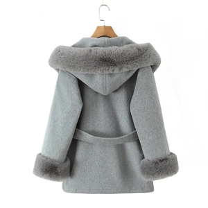 Detailed back view of a grey hooded wool coat with luxury faux fur collar and belt
