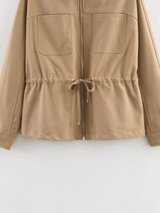 Detail of khaki cargo jacket with drawstring waist and metallic zipper closure