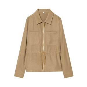 Detail of khaki drawstring jacket featuring chest pockets and metallic zip closure