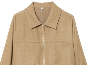 Detailed view of khaki twill jacket with gold zipper and neat double stitching