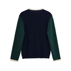 Vue de dos à plat d'un pull en maille bleu marine et vert à col rond pour femme en détail