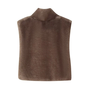 Detailed view of dark brown faux fur texture and high collar on the plush vest