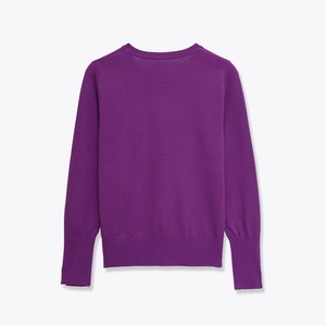 Detailed back view of dark purple knit sweater featuring ribbed cuffs and hemline