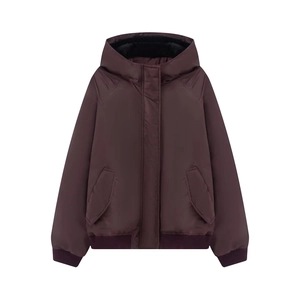 Detail of dark burgundy hooded flight jacket with plush lining and ribbed cuffs