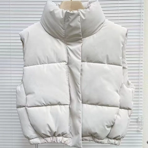 Women's cropped PU leather puffer vest with stand collar and elastic waist in beige