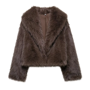 Detail view of smooth inner lining and wide lapel texture on dark brown faux fur coat