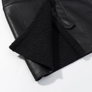 Macro detail of high-quality black PU leather jacket with thick faux shearling lining