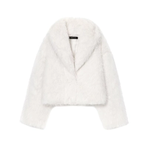 Detail of white faux fur coat showing fluffy texture, collar, and brand inner label