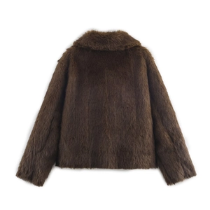 Detail view of the back of a thick dark brown faux fur jacket with long plush texture