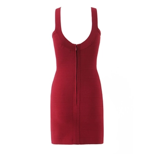 Detail view of the deep red bodycon dress featuring a textured bandage fabric and back zipper