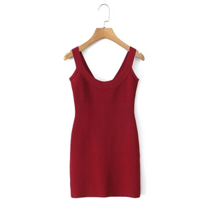 Detail shot of wine red bodycon bandage dress with textured horizontal knit pattern