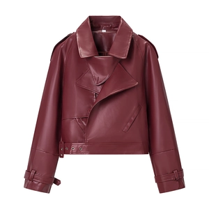 Detail of burgundy biker jacket with adjustable belt buckles and metallic eyelets