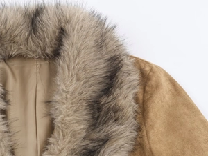 Detailed view of the brown suede jacket featuring a thick faux fur collar and smooth lining