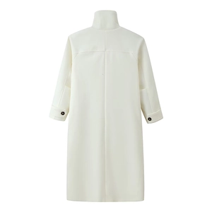 Rear view of white long wool coat featuring a funnel neck and structured center seam