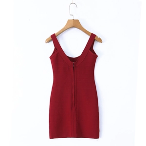 Detail of red knit dress showing back concealed zipper and stretch bandage texture