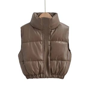Detail of coffee brown PU leather puffer vest with stand collar and quilted texture