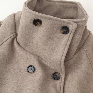 Short wool coat for women with stylish stand collar and tortoise shell buttons