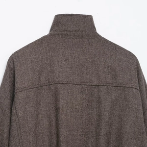 Brown herringbone bomber jacket with stand collar and textured wool fabric detail