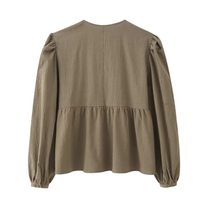 Women's olive green long sleeve shirt with puff sleeves and ruffled peplum hemline